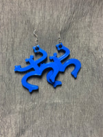 Load image into Gallery viewer, Royal blue hanging coqui earrings.
