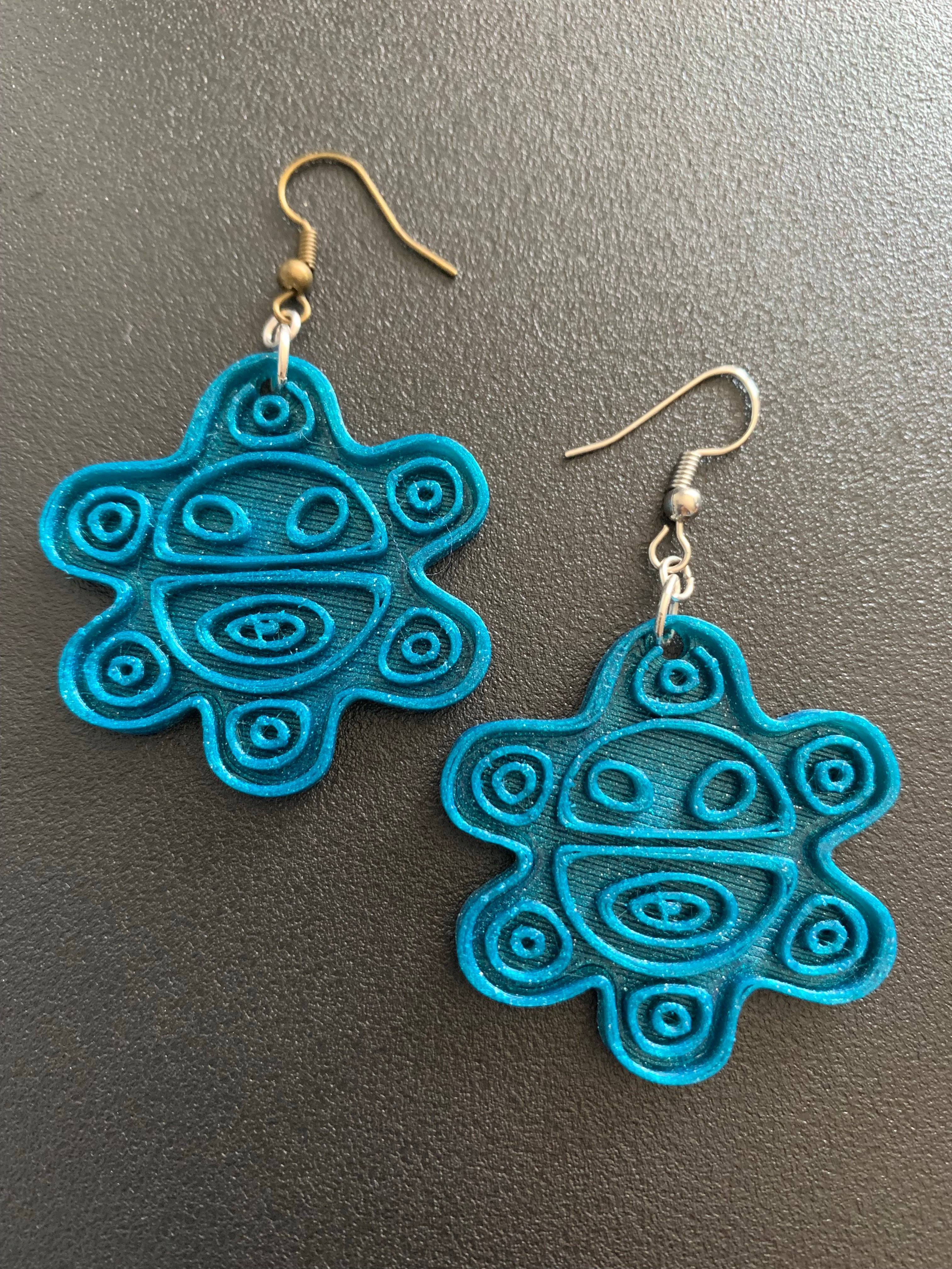 Taino sun earrings