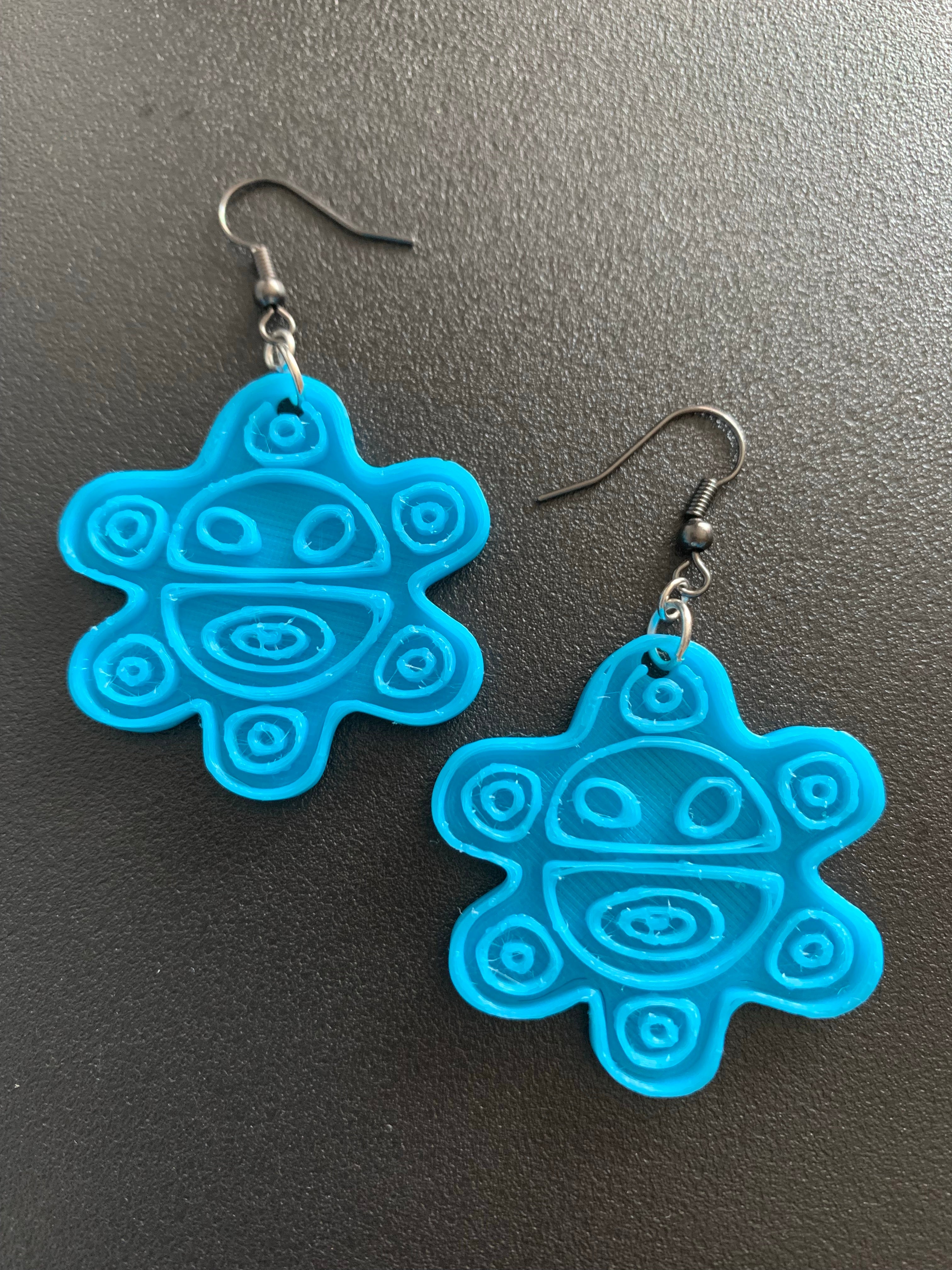 Taino sun earrings