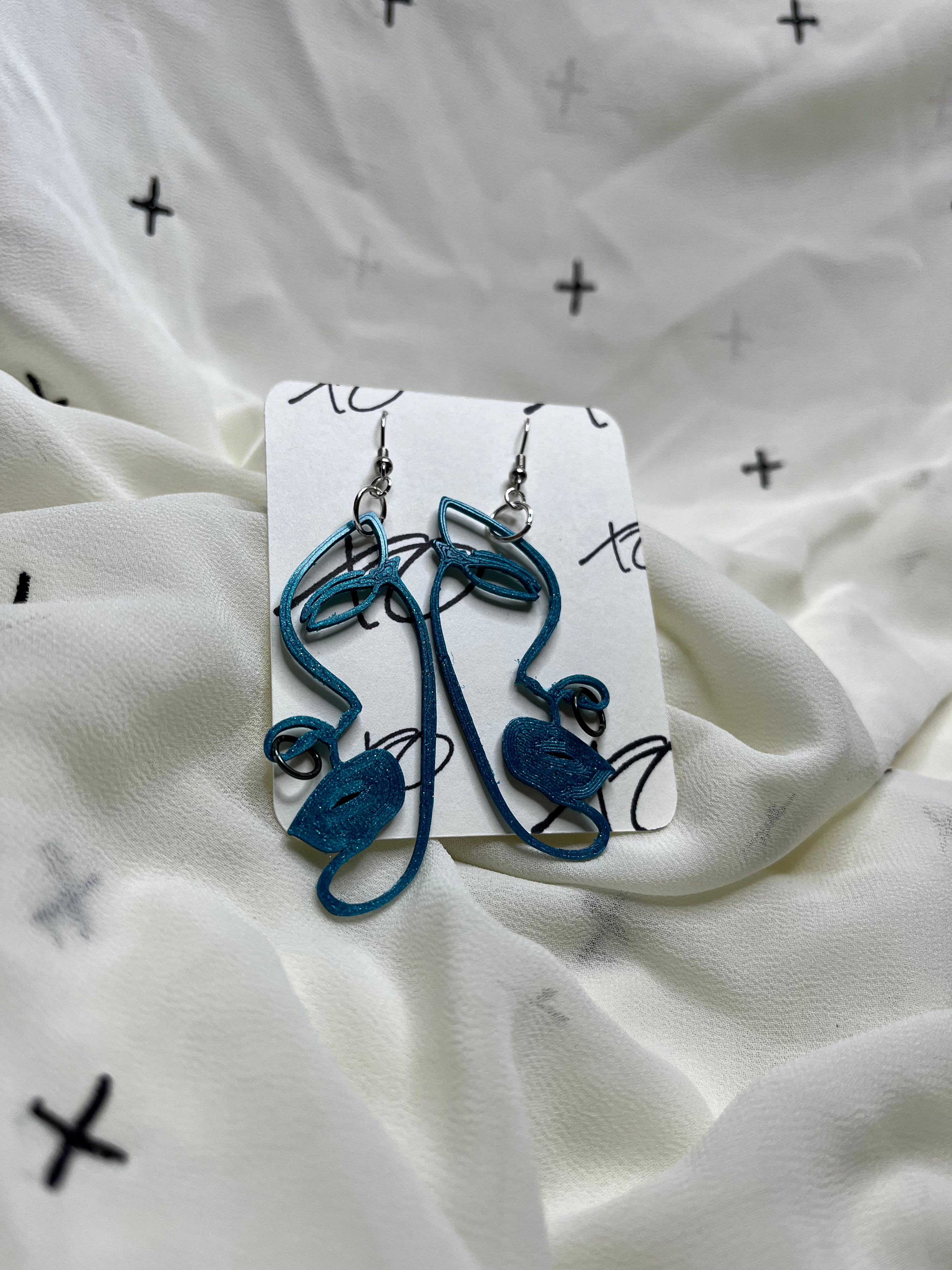 Profile girl earrings