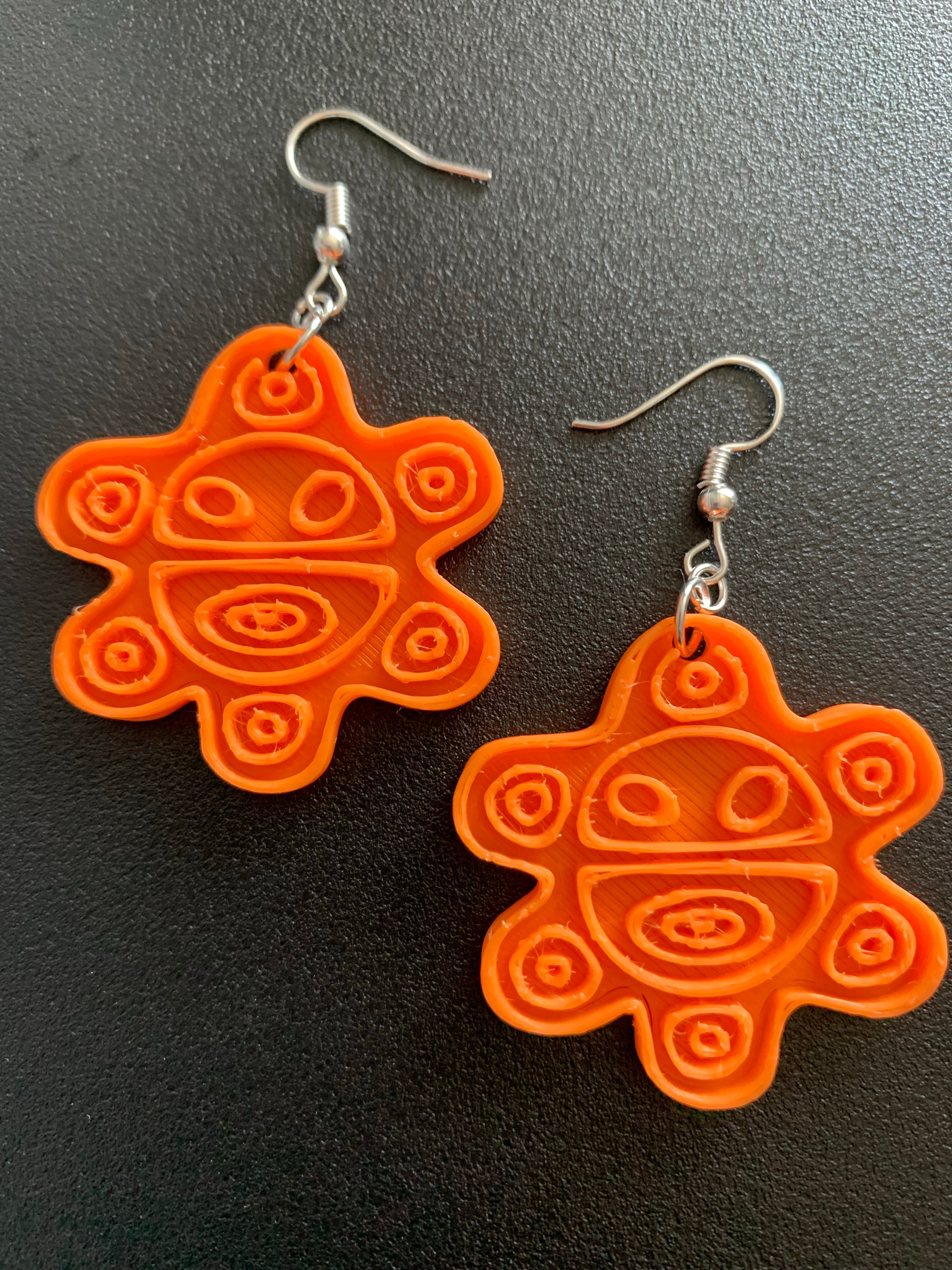 Taino sun earrings